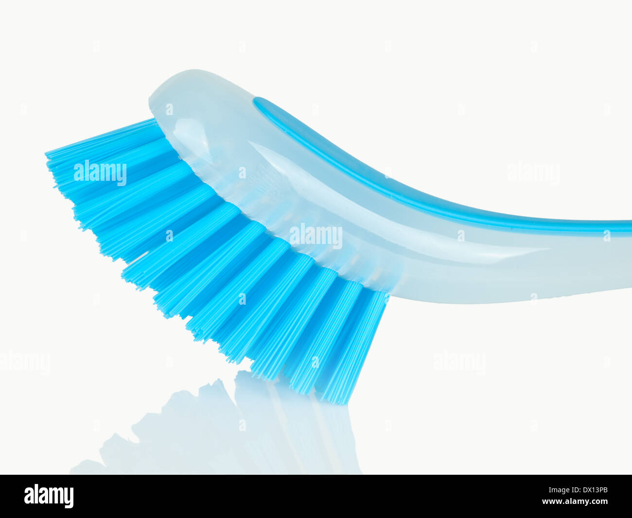 Blue plastic brush isolated on white background Stock Photo - Alamy