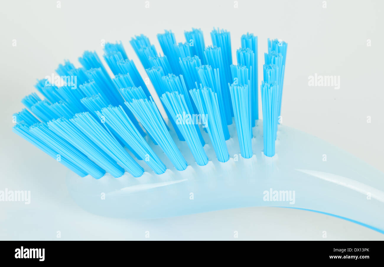 Blue plastic brush isolated on white background Stock Photo - Alamy