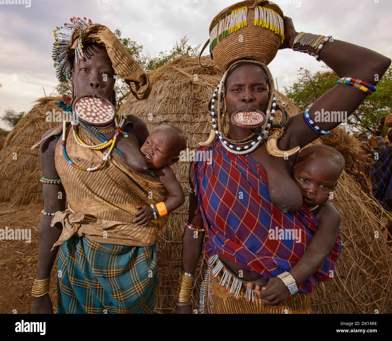 Mursi women with lip plates in the Lower Omo Valley of Ethiopia Stock Photo  - Alamy