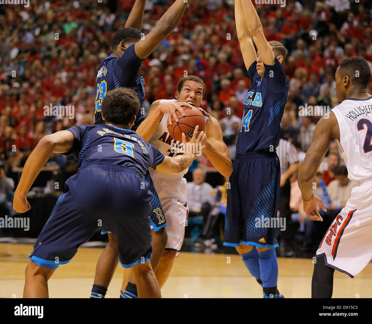 Las Vegas, NV, USA. 15th Mar, 2014. Mar 15 2014 - Las Vegas NV, U.S - Arizona F # 11 Aaron Gordon force his way to the hoop surrounded by UCLA players during NCAA Men's Basketball game between Arizona Wildcats and UCLA Bruins 71-75 lost at MGM Grand Garden Arena Las Vegas, NV Credit:  csm/Alamy Live News Stock Photo