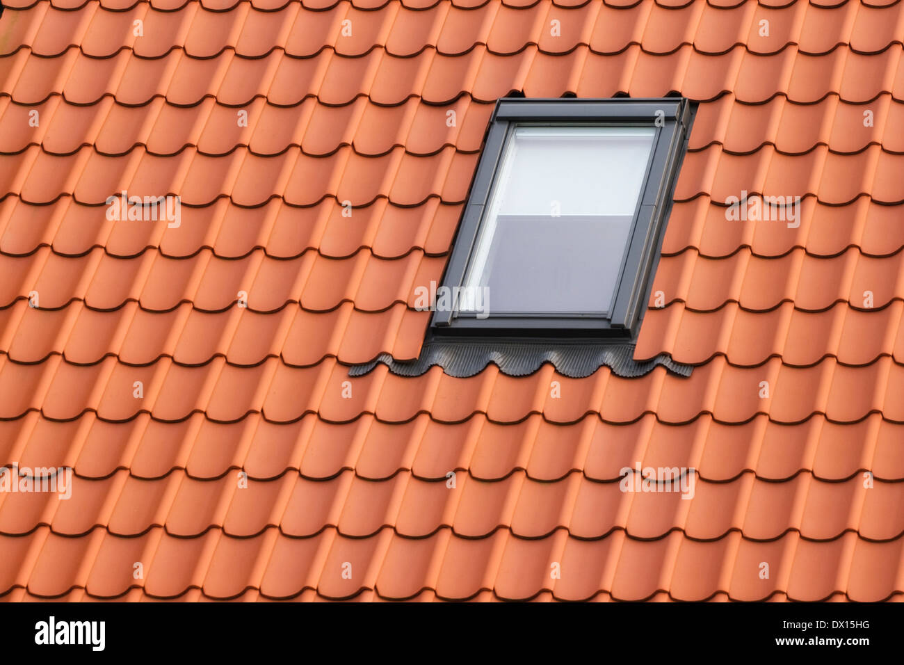 Roof with red tiling and dormer Stock Photo