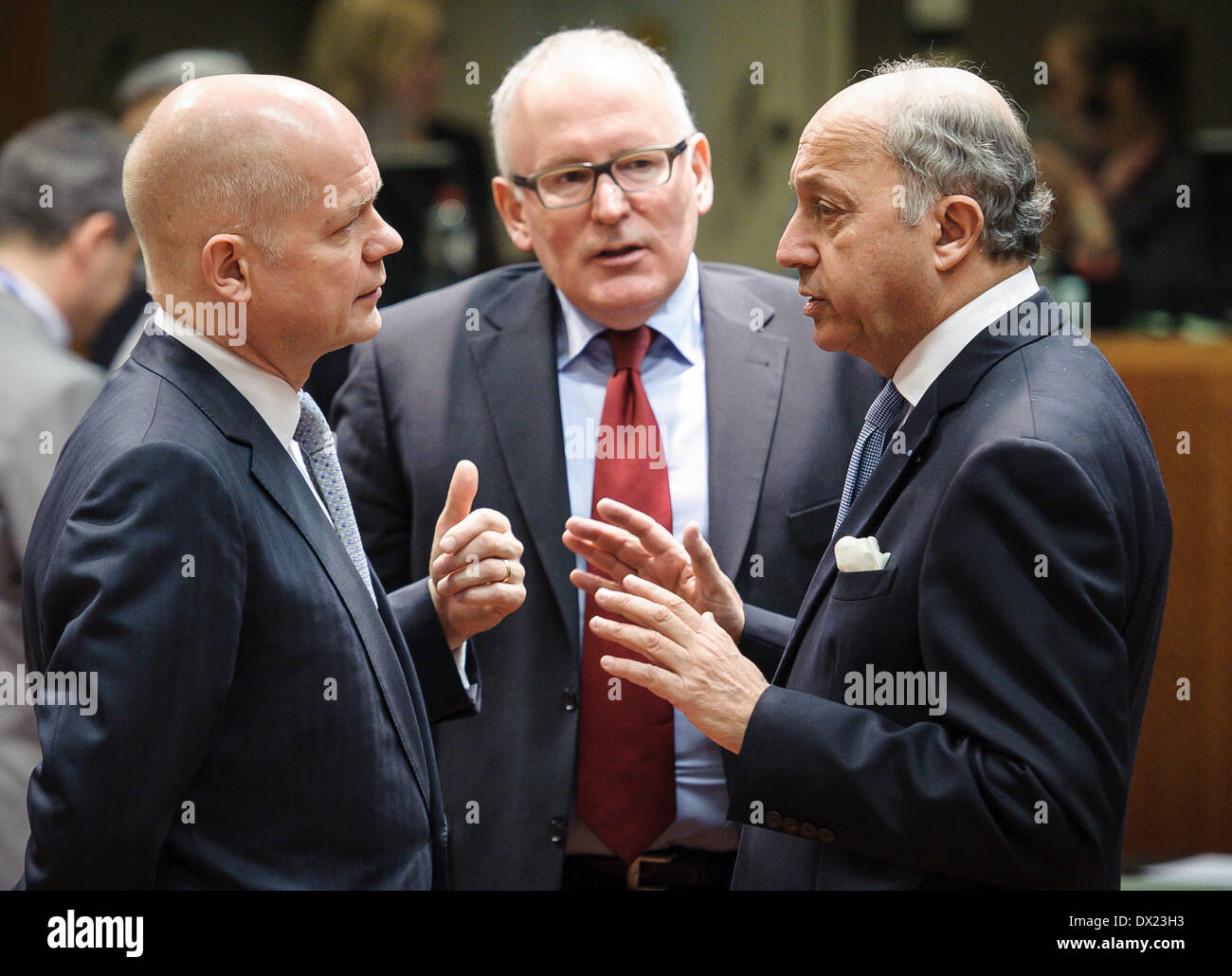 Brussels, Belgium. 17 March 2014. (L-R) British Foreign Secretary William Hague, Dutch Foreign minister Frans Timmermans and French Foreign Minister Laurent Fabius at the start of the European Union Foreign Ministers council on the situation in Ukraine at European Council headquarters in Brussels, Belgium on 17.03.2014 EU foreign ministers are due to discuss further sanctions against Russia after a Moscow-backed referendum in Crimea backed a split from Ukraine. Credit:  dpa picture alliance/Alamy Live News Stock Photo