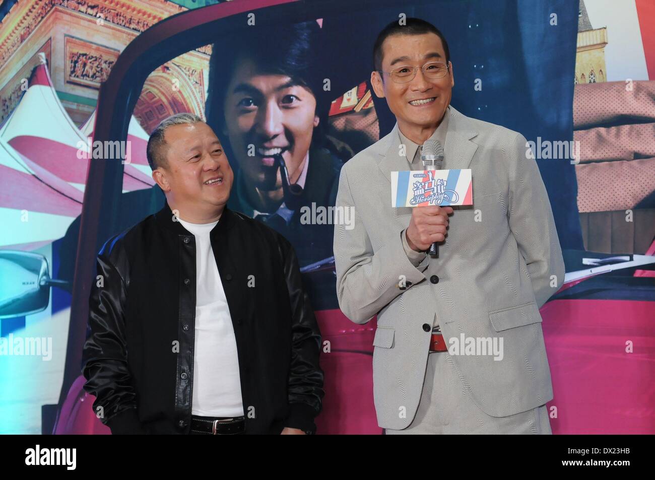Beijing, China. 17th Mar, 2014. Actors Eric Tsang (L) and Tony Leung Ka Fai speak during the premiere of the movie 'Horseplay' in Beijing, capital of China, March 16, 2014. The movie 'Horseplay' will hit the screen across the county on March 21. Credit:  Xinhua/Alamy Live News Stock Photo