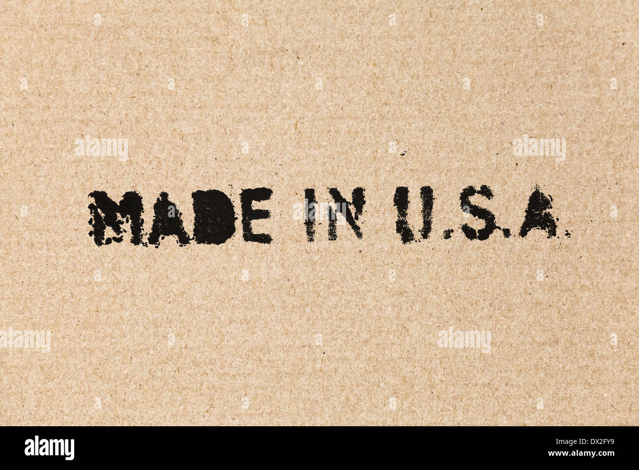 Made in USA. Black label on brown cardboard box Stock Photo