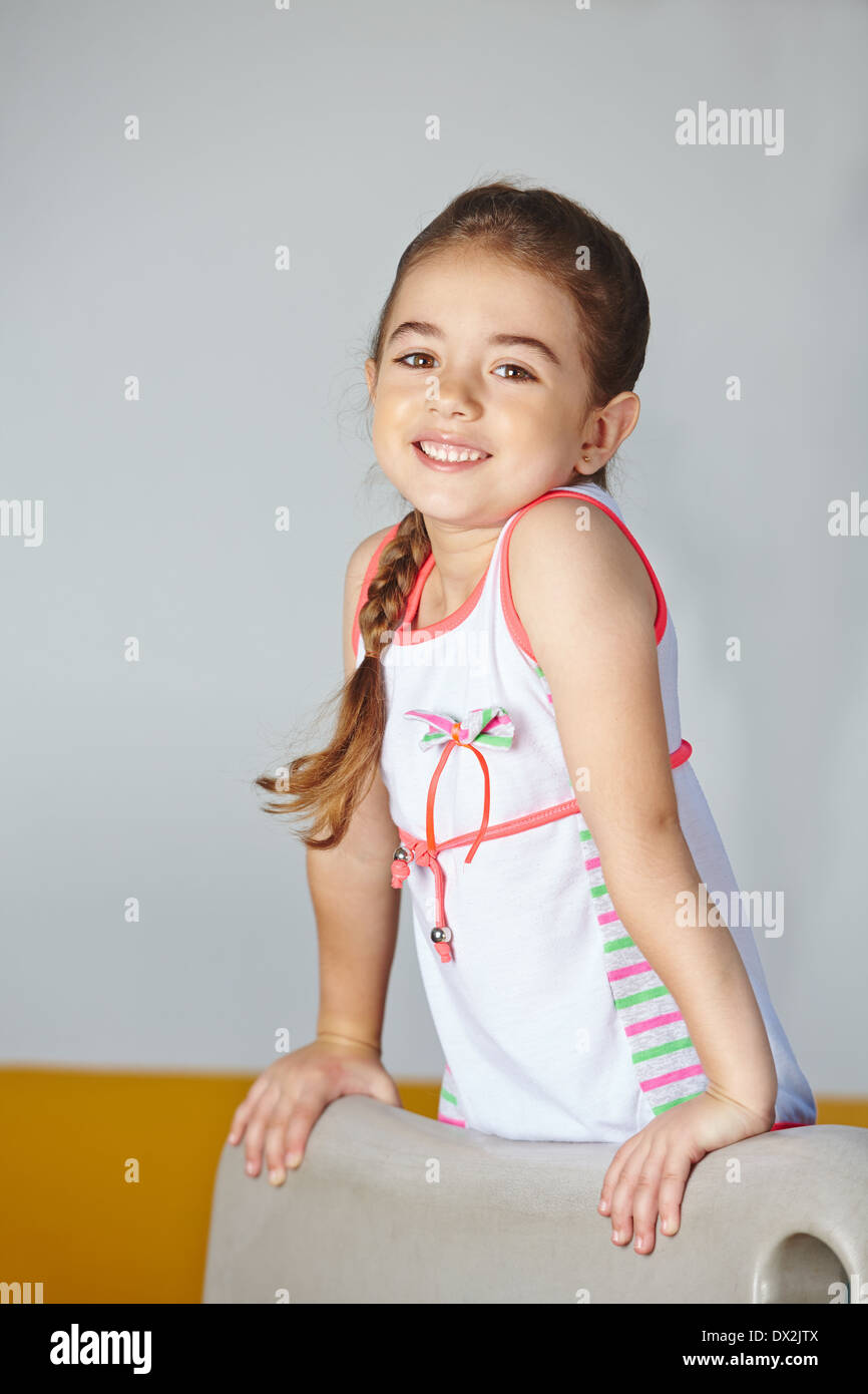 Portrait of a happy girl playing in kindergarten Stock Photo