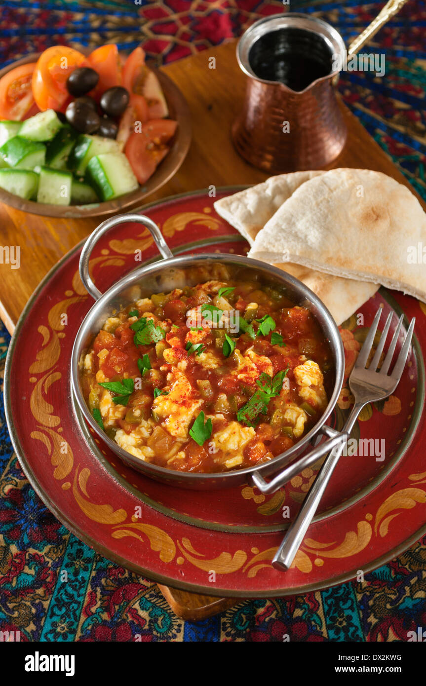 Menemen. Scrambled eggs with peppers and tomatoes. Turkish food Stock Photo
