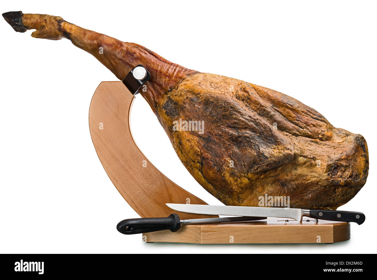 A front leg of Serrano ham mapped on a wooden stand on a white background. Stock Photo