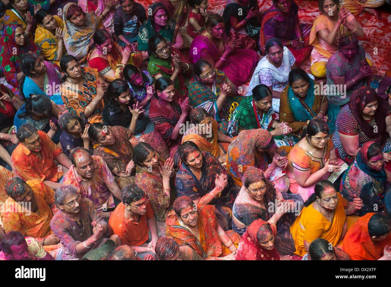 Calcutta. 17th Mar, 2014. Indian devotees celebrate the Holi festival, also known as festival of colors, at a temple in Calcutta, capital of eastern Indian state West Bengal, March, 17, 2014. The Holi festival is a popular Hindu spring festival observed in India at the end of winter season on the last full moon day of the lunar month. Credit:  Tumpa Mondal/Xinhua/Alamy Live News Stock Photo