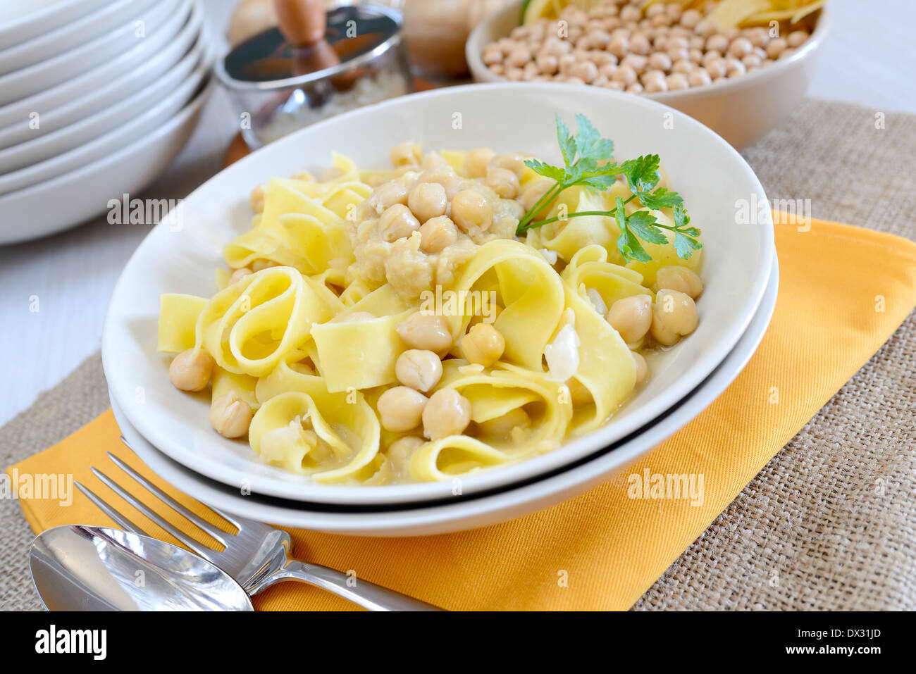 Homemade italian tagliatelle pasta with chickpeas cream and Stock Photo