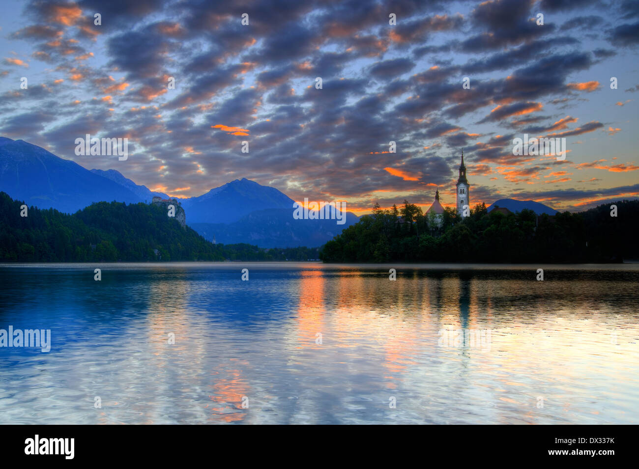 Church on the island - Lake bled in early morning Stock Photo