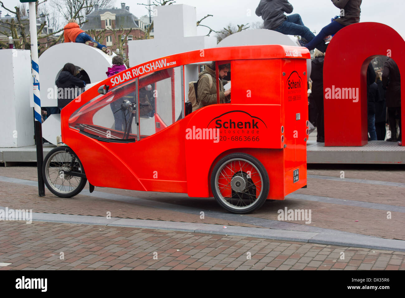 solar powered rickshaw in Amsterdam Stock Photo