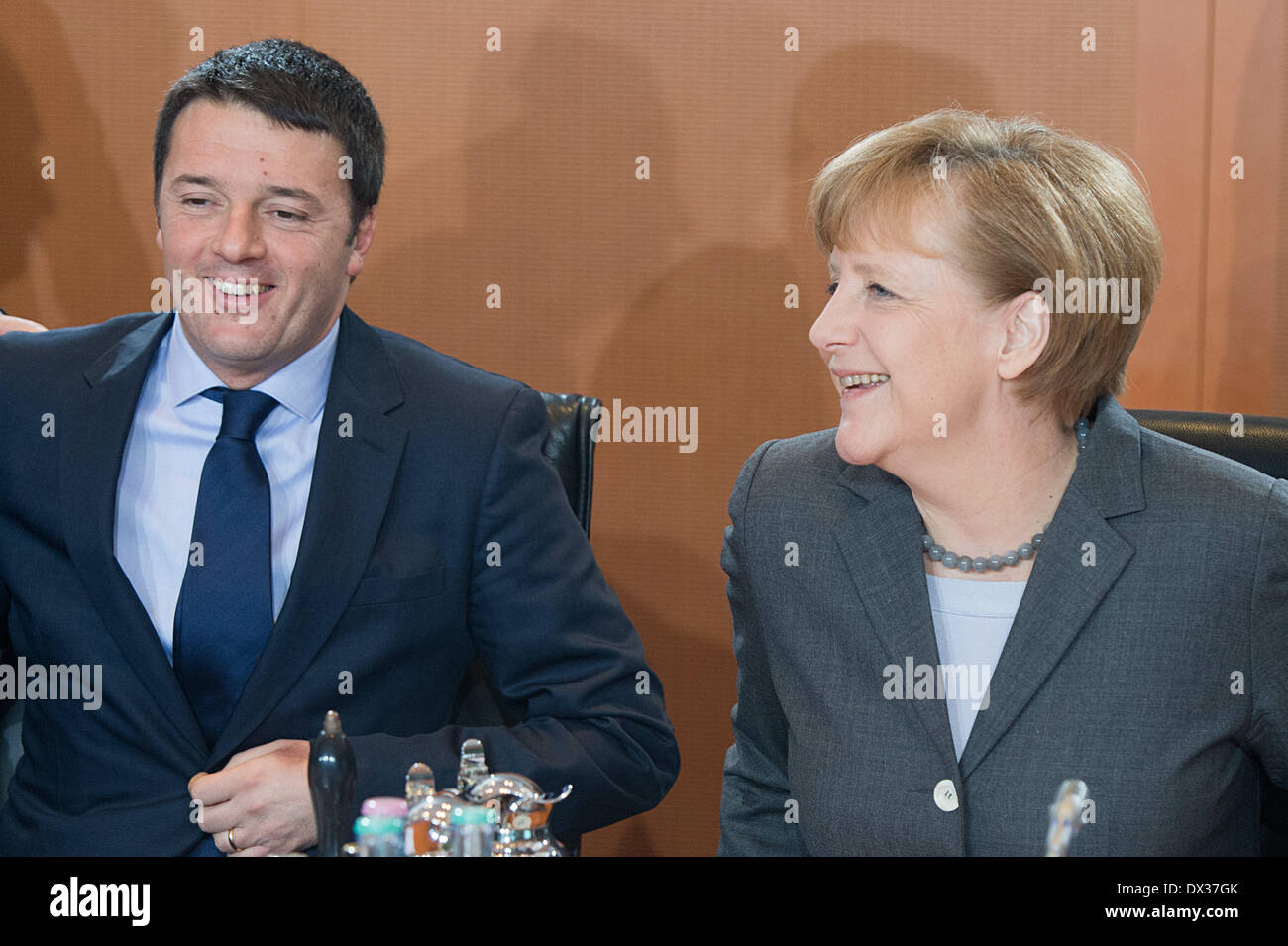 Berlin, Germany. 17th Mar, 2014. German Chancellor Angela Merkel (CDU, R) and new Italian Prime Minister Matteo Renzi meet with representatives of their governments for a cabinet session in the German Chancellery in Berlin, Germany, 17 March 2014. On his inaugural visit to Germany Renzi is accompanied by ministers during the German-Italian government consultations. Photo: Maurizio Gambarini/dpa/Alamy Live News Stock Photo
