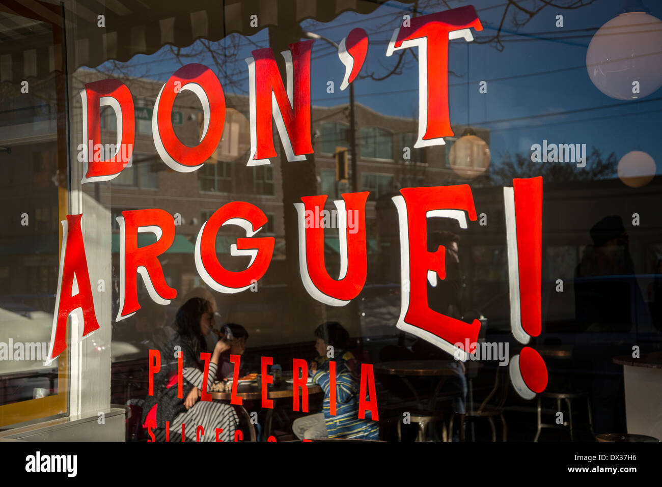 Main Street, Vancouver, 'Don't Argue', Pizzeria store window, British Columbia, Canada Stock Photo