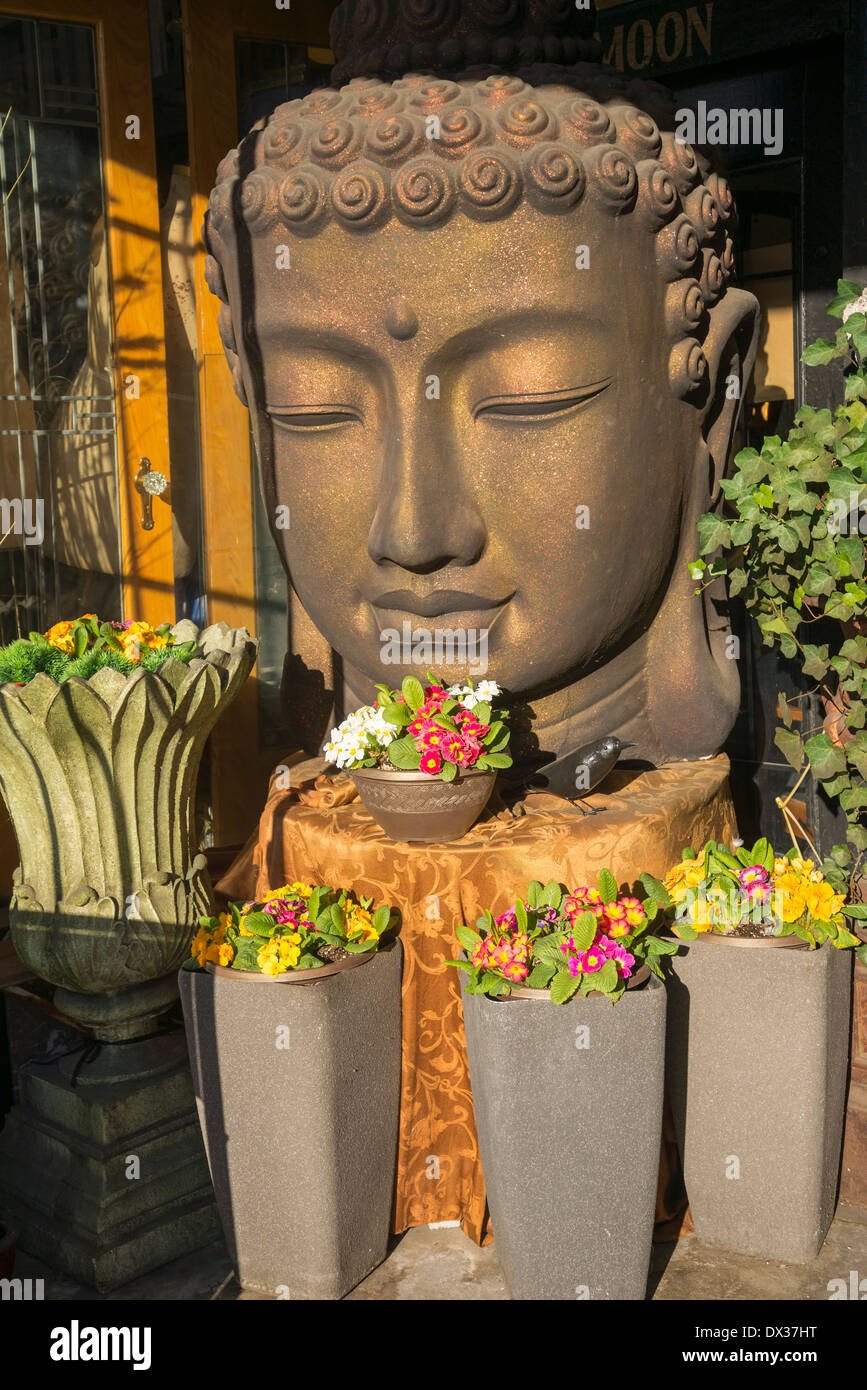 Buddha figure at Antique store entrance, Vancouver, British Columbia, Canada Stock Photo