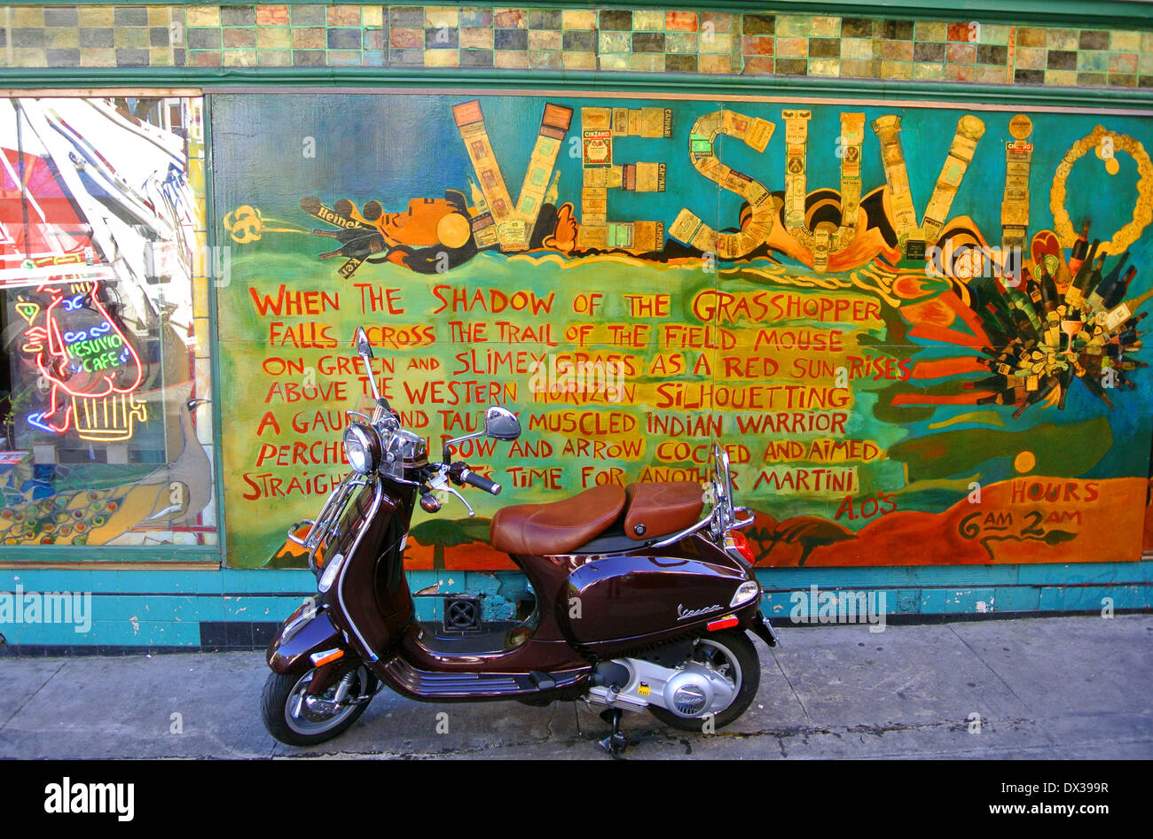 Vespa motor scooter parked in front of art work historic Vesuvio Cafe