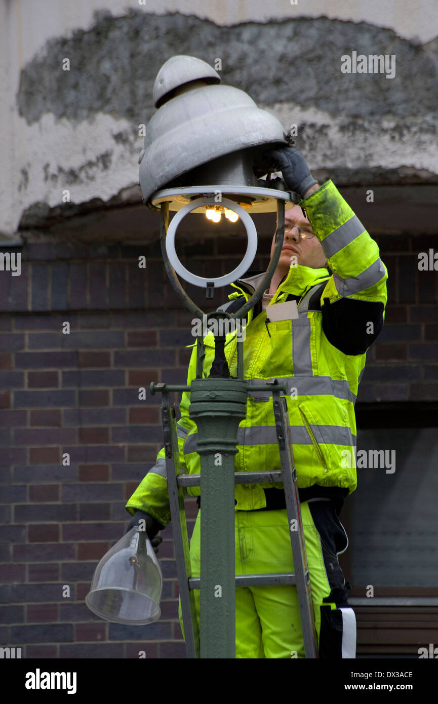 Maintenance of a gas lantern Stock Photo Alamy