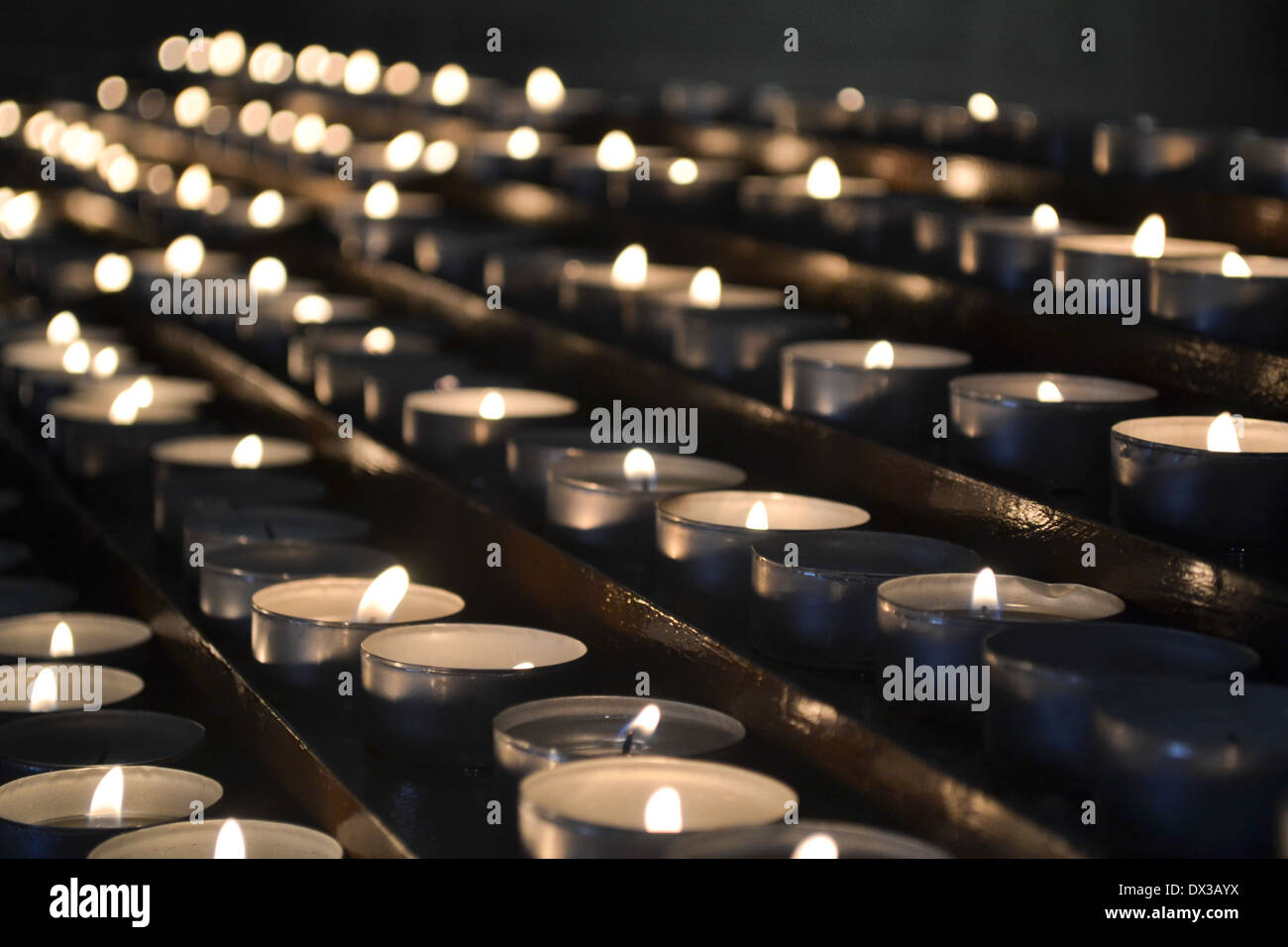 Offering candles in a church hi-res stock photography and images - Alamy