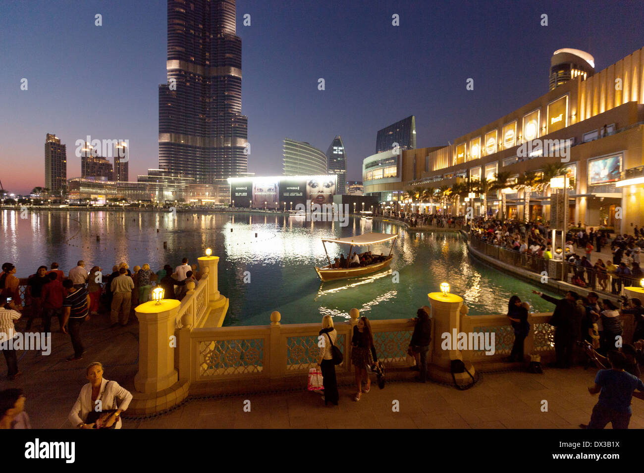 Dubai Mall and Lake at night, with tourist boats, Dubai, UAE, United Arab Emirates, Middle East Stock Photo