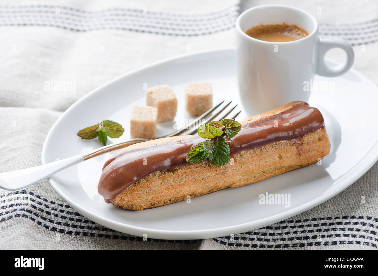 Coffee and eclair cake with coffee Stock Photo