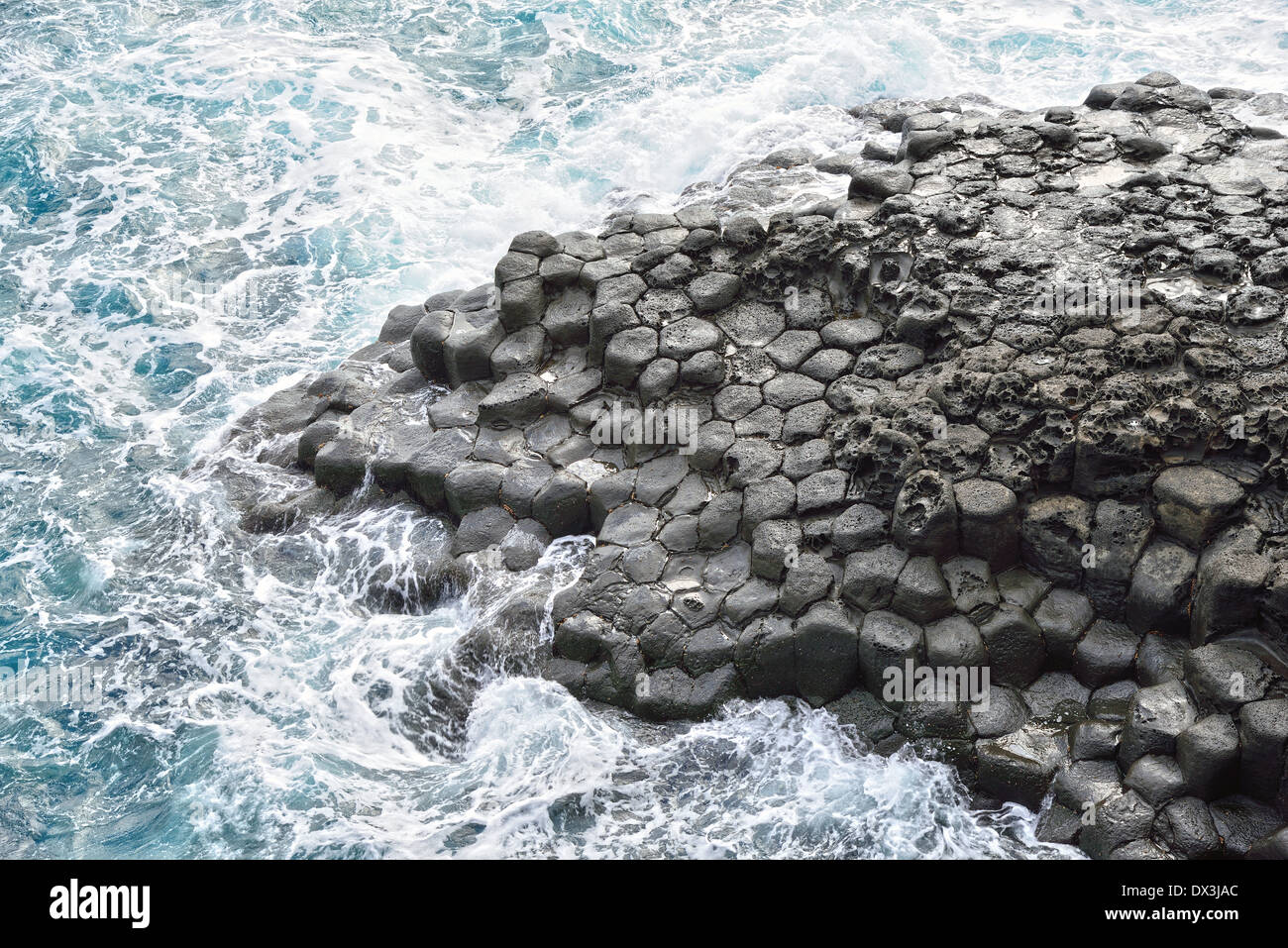 basaltic columnar joint coast in JungMun in Jeju Island Stock Photo