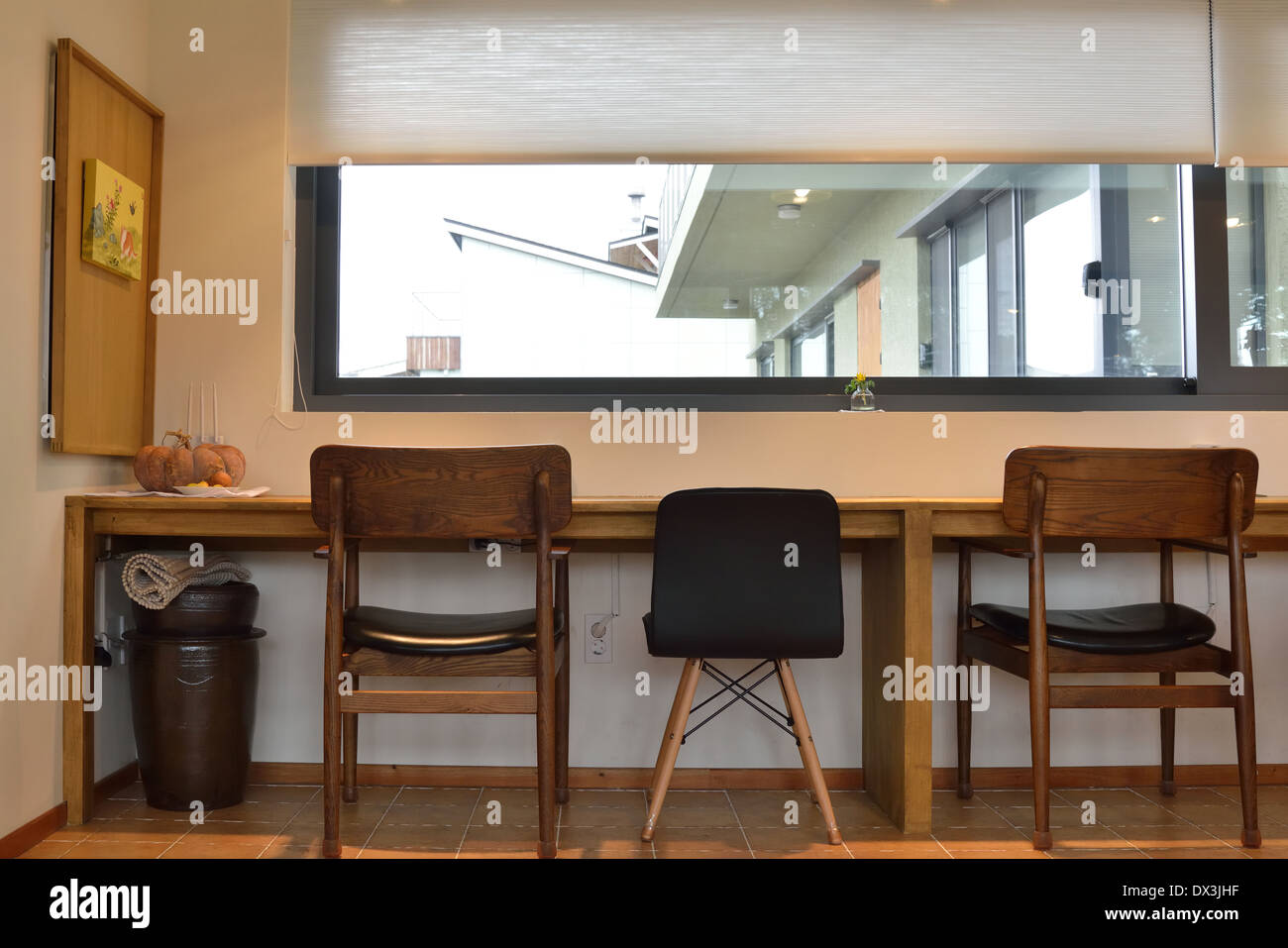 Chairs and Desk in front of windows Stock Photo Alamy