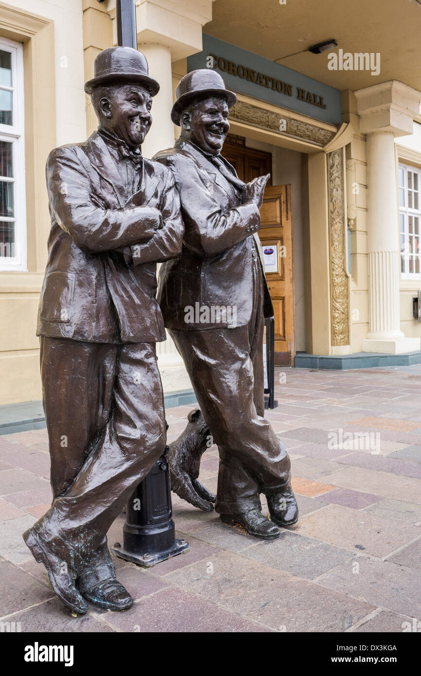 Statue of Stan Laurel and Oliver Hardy outside the Coronation Hall Theatre, Ulverston, Cumbria. Stock Photo