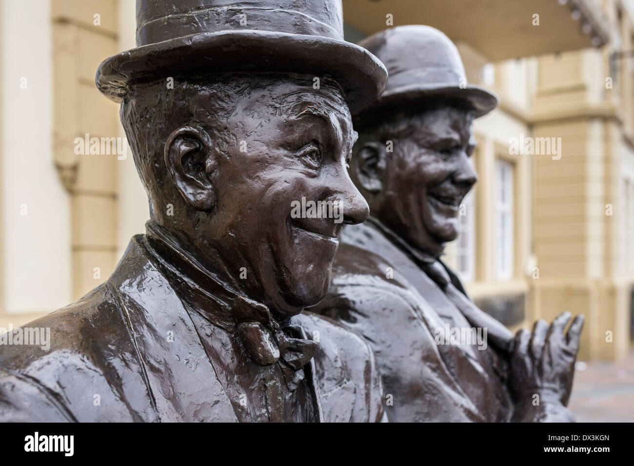 Statue of Stan Laurel and Oliver Hardy outside the Coronation Hall Theatre, Ulverston, Cumbria. Stock Photo