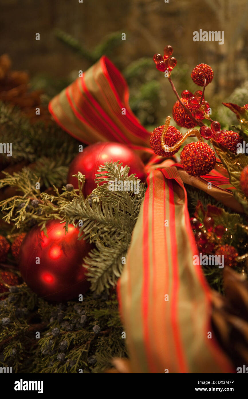 Green and red Christmas garland with ornaments Stock Photo