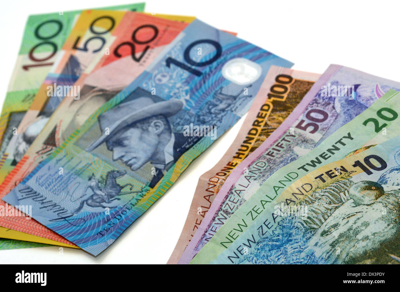 New Dollar bank notes and Australian Dollar banknotes. Concept photo of money, banking ,currency foreign exchange rates Photo - Alamy