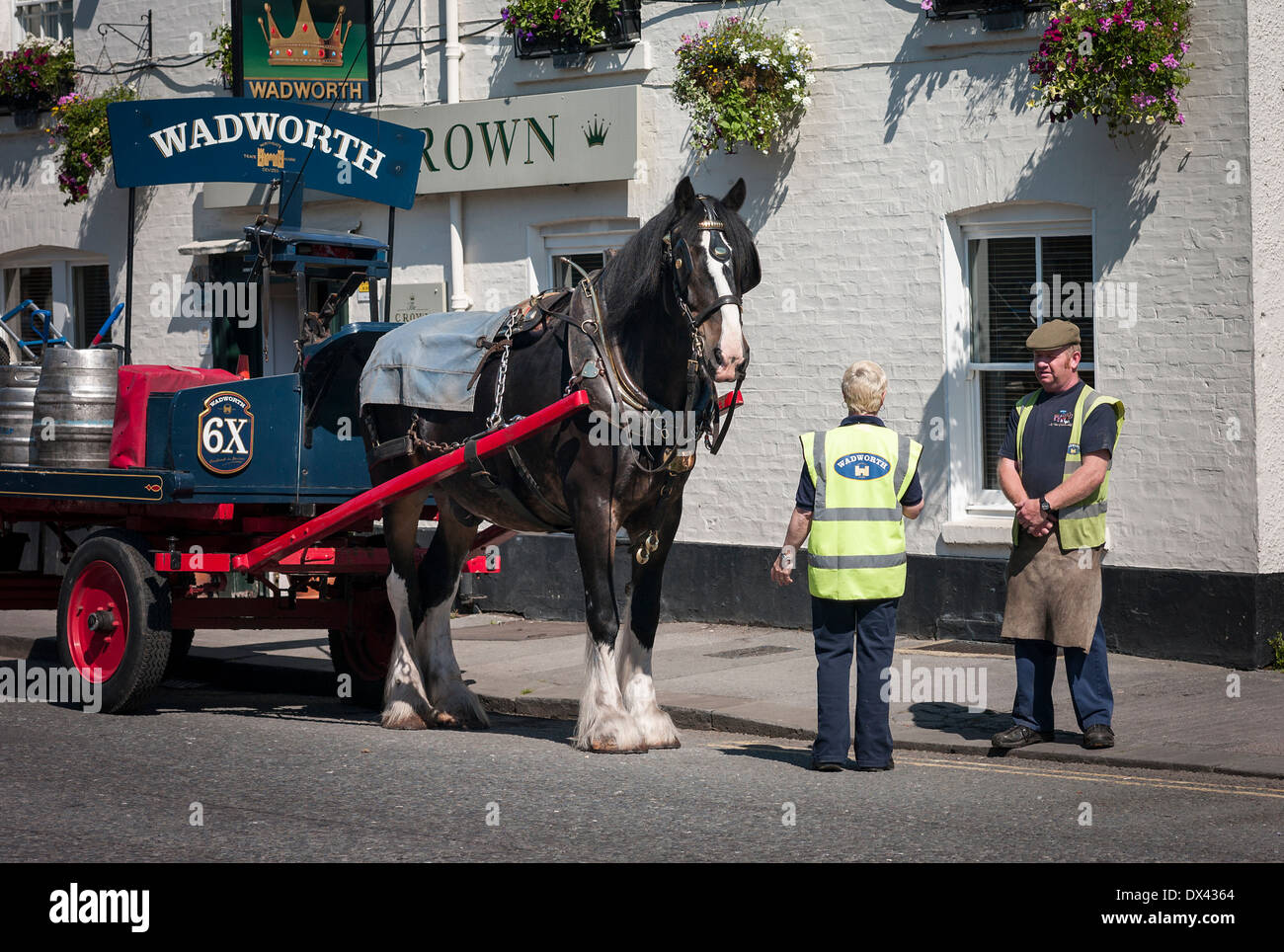 Wadworth horse drawn beer dray delivering goods in Devizes UK Stock
