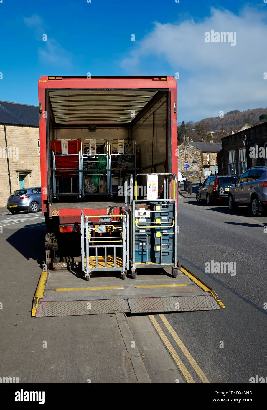 The back of a Royal mail lorry loading mail trucks using a tail lift Bakewell Derbyshire England uk Stock Photo