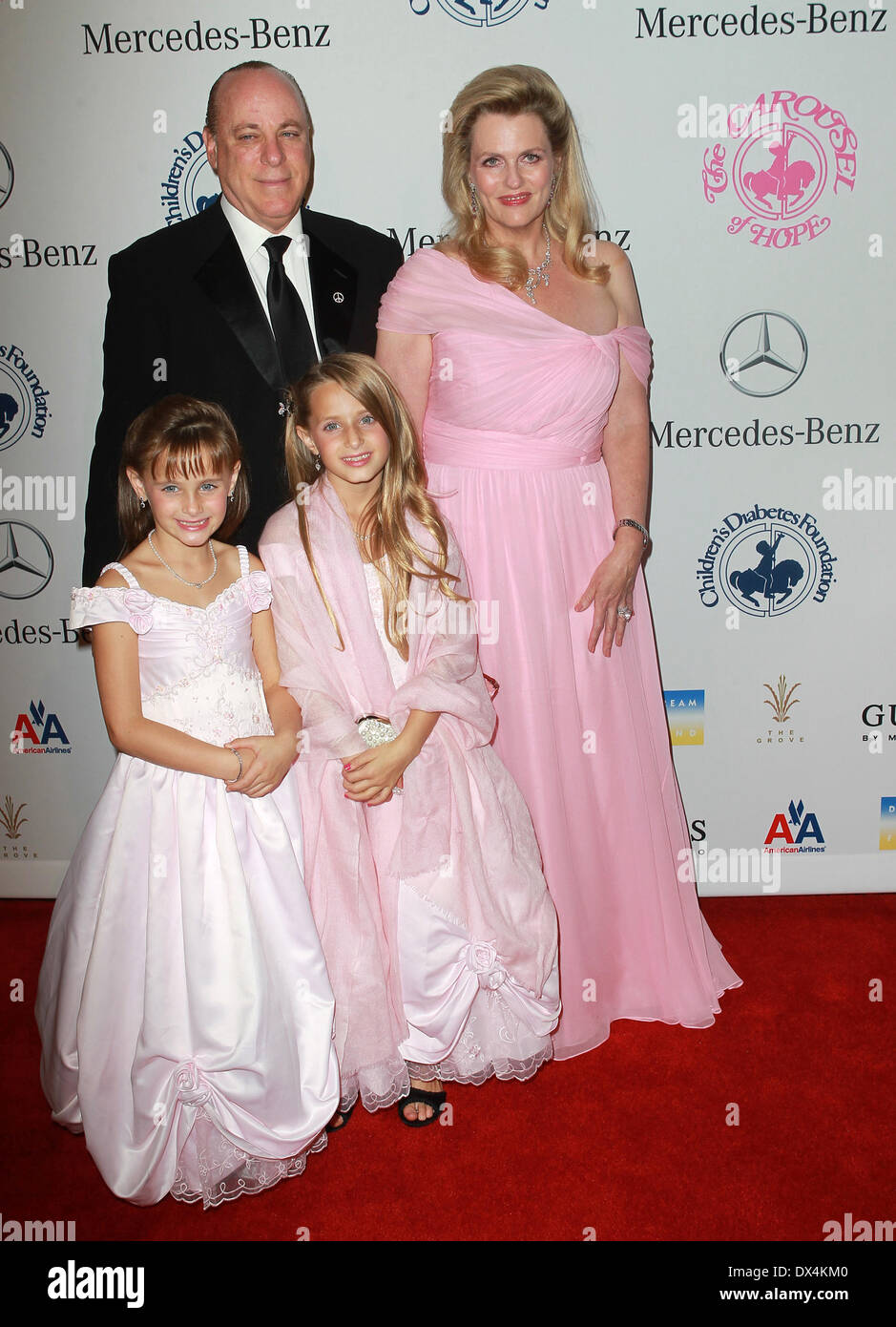 Nancy Davis husband Ken Rickel with daughters Isabella Rickel and Ariana Rickel 26th Anniversary Carousel Of Hope Ball - Presented By Mercedes-Benz - Arrivals Los Angeles, California - 20.10.12 Where: Beverly Hills, California, United States When: 20 Oct 2012 Stock Photo