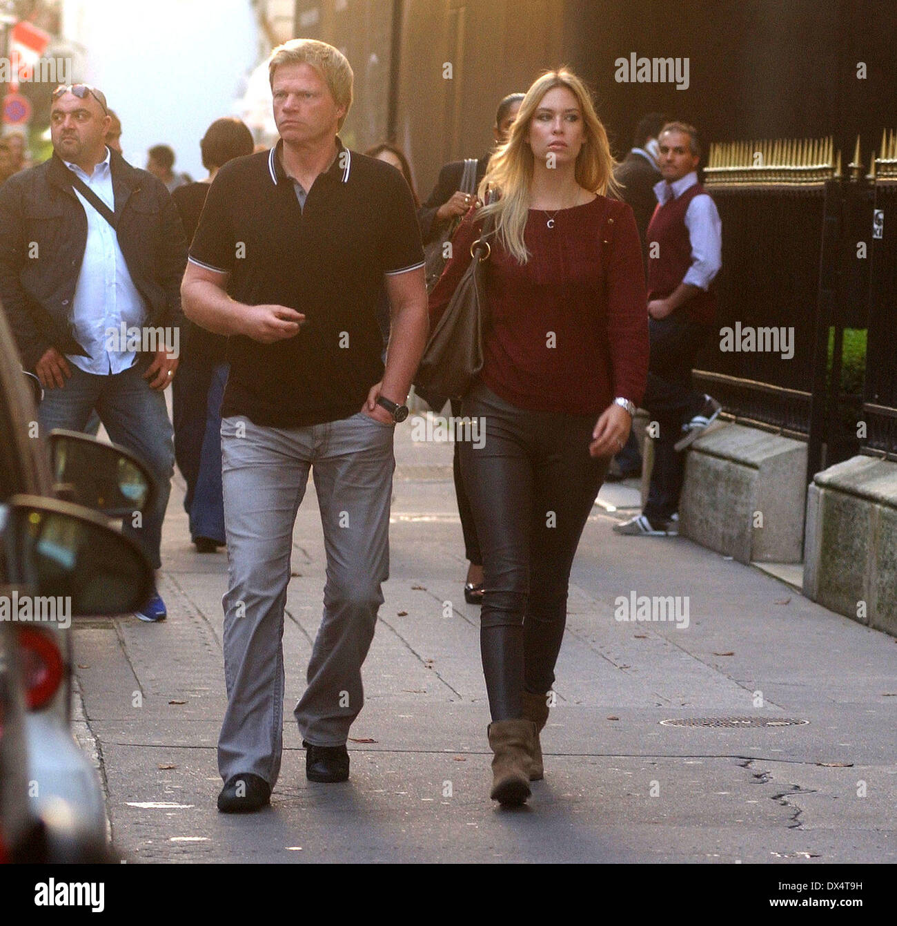 Oliver Kahn and his wife Svenja take a walk along Avenue Montaigne
