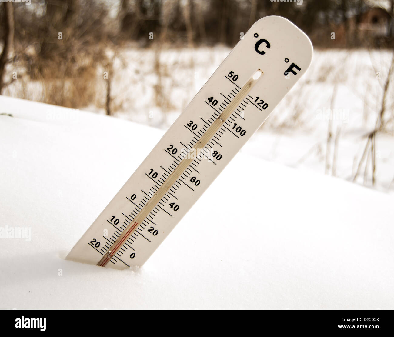 Thermometer in the snow Stock Photo