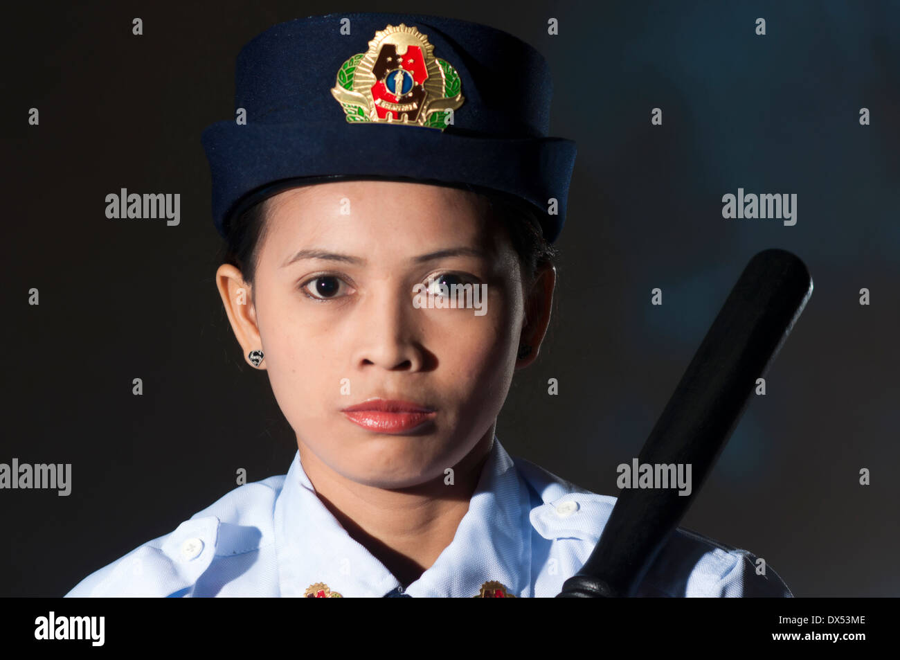female security guard in studio setting Stock Photo Alamy
