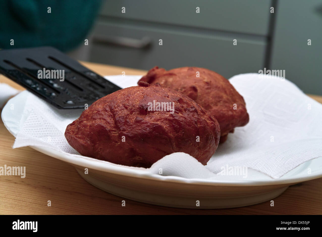 Homemade donuts with rose's stuffing. On the Polish table, in Polish