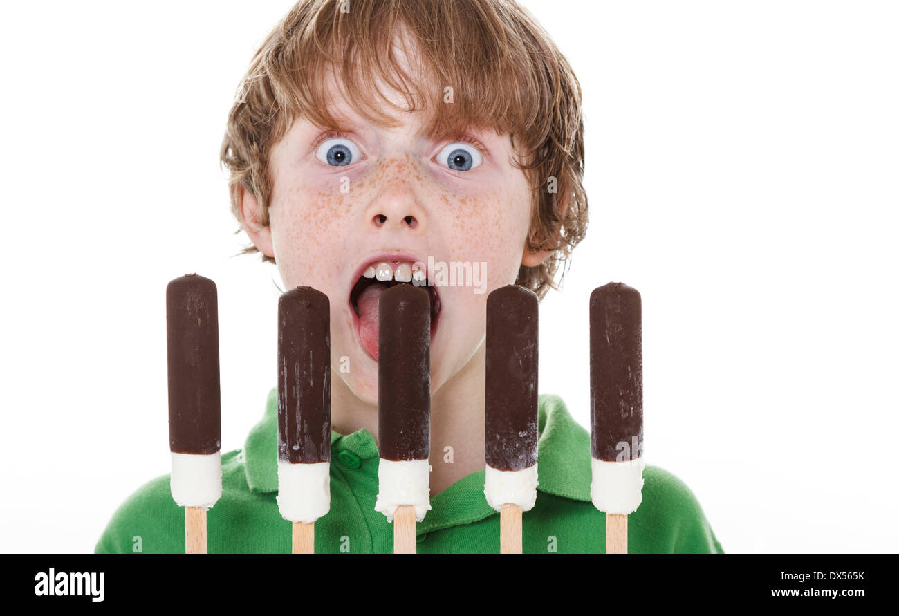 Boy with 5 ice lollies Stock Photo