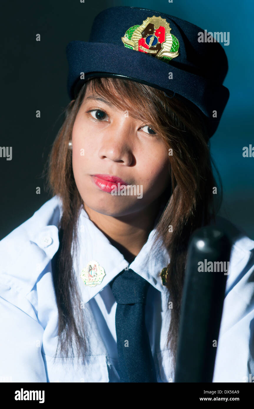 female security guard in studio setting Stock Photo Alamy