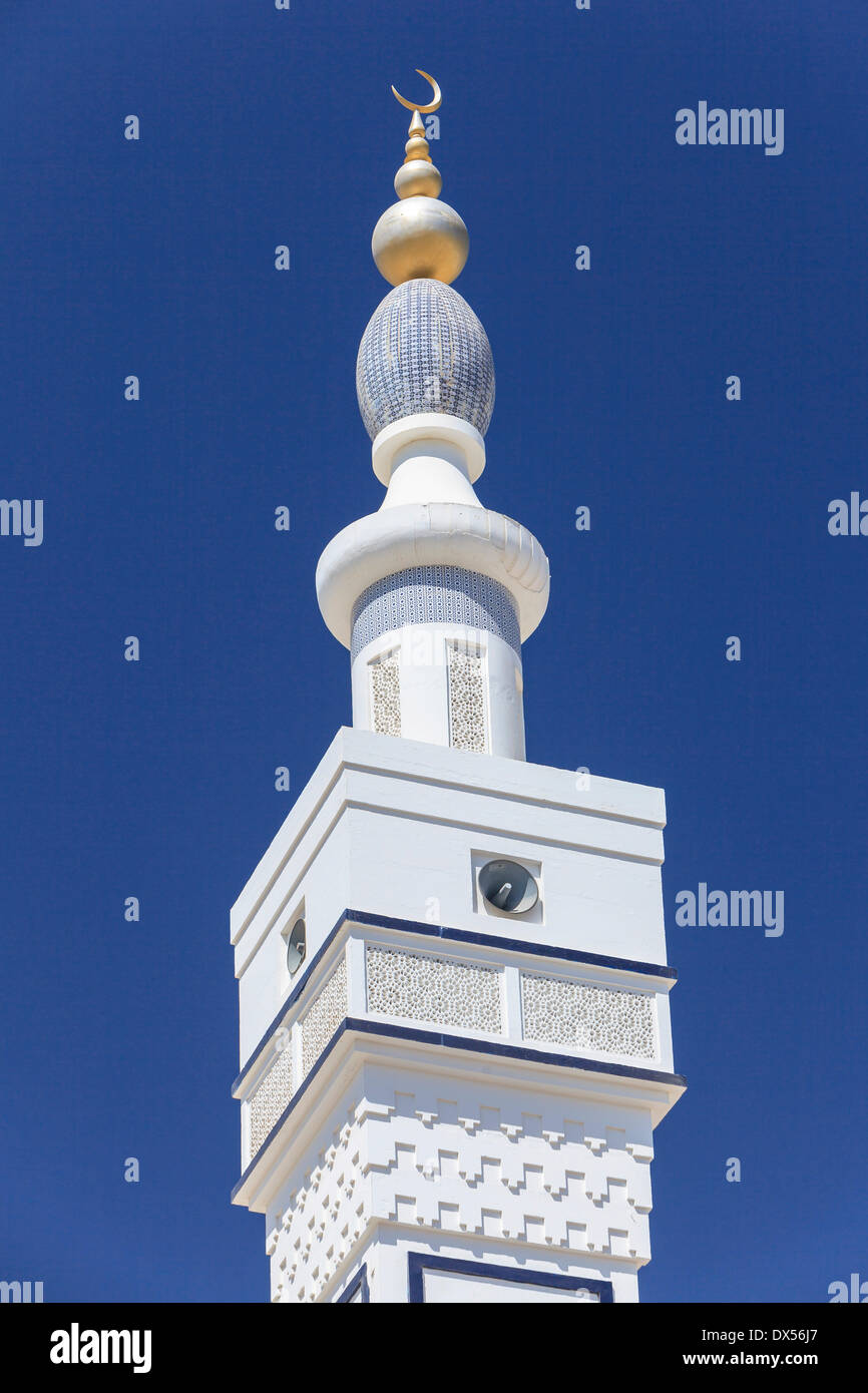 Minaret with a golden crescent moon, Bilad Mosque, Sur, Ash Sharqiyah, Oman Stock Photo