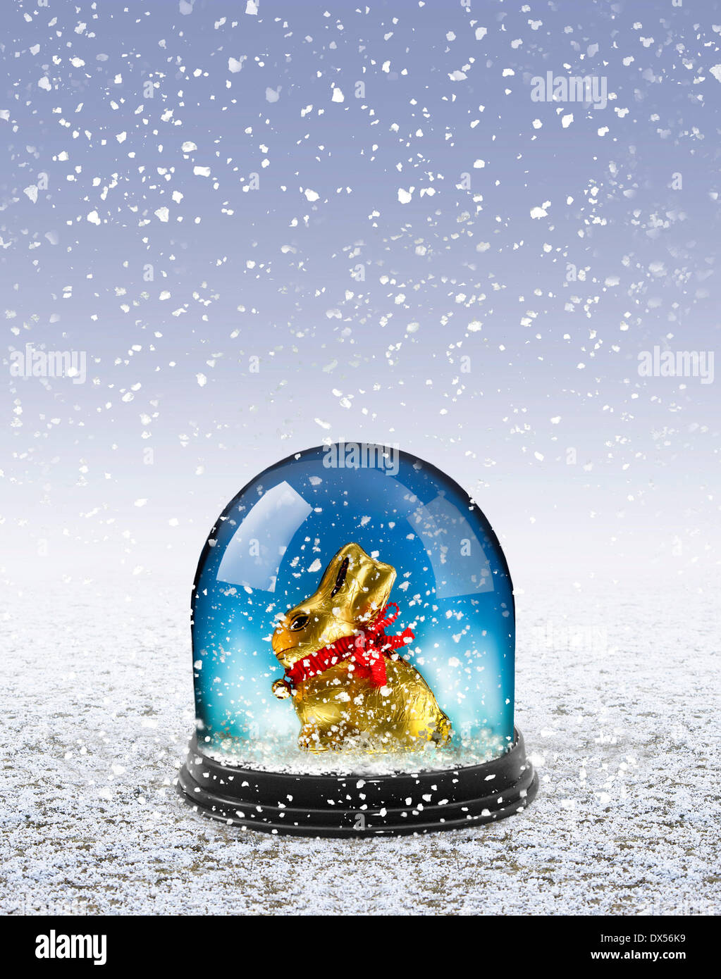 Easter bunny in a snow dome in snow Stock Photo