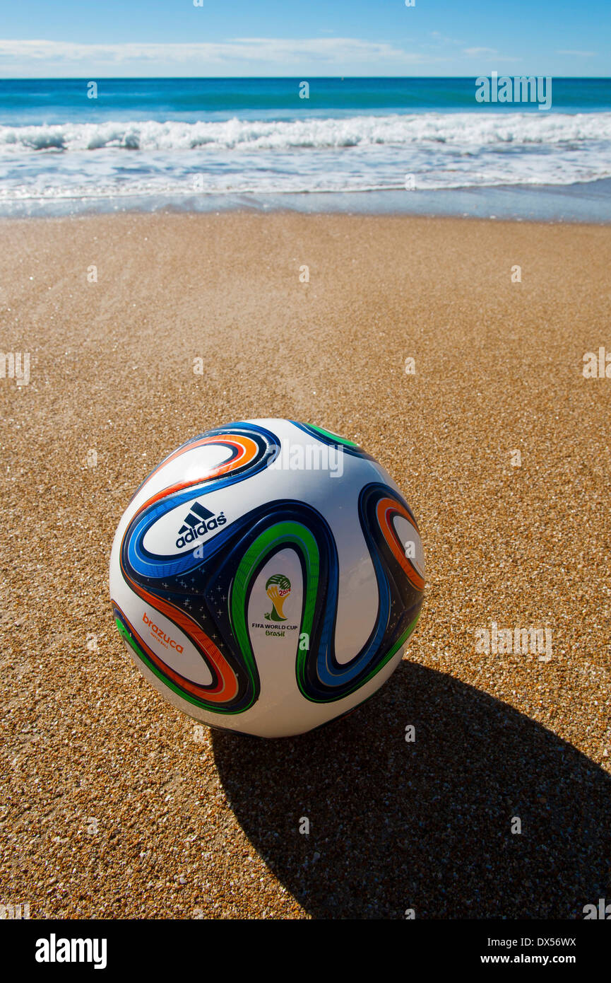 Brazuca", match ball of FIFA World Cup Brazil 2014 on a sandy beach  (official Replica Ball Stock Photo - Alamy