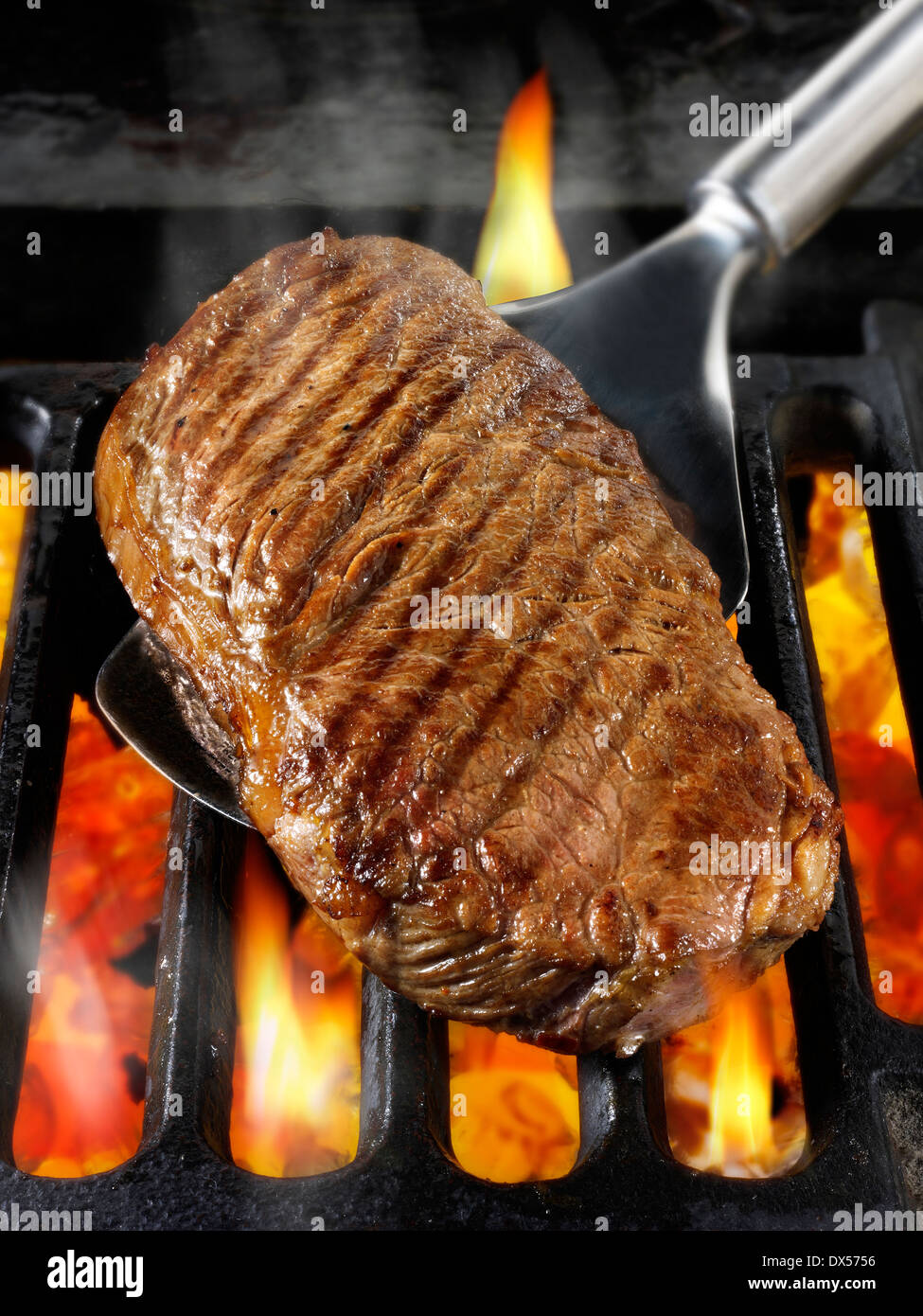 Sirloin beef steaks being cooked on a bbq. Meat food photos, pictures