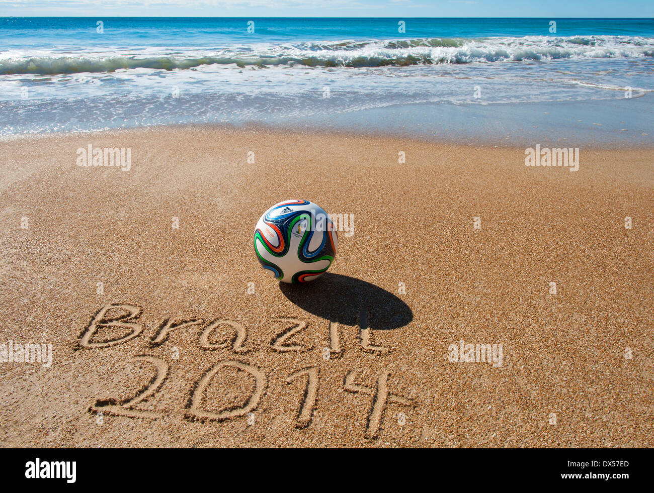 Brazuca, match ball of FIFA World Cup Brazil 2014 on a sandy beach  (official Replica Ball Stock Photo - Alamy