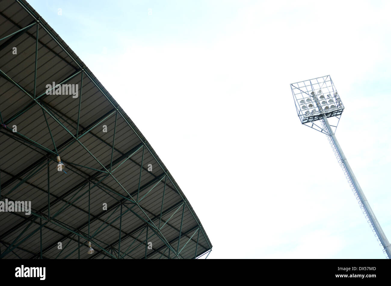 stadium light poles with white clouds and blue sky backgrounds Stock