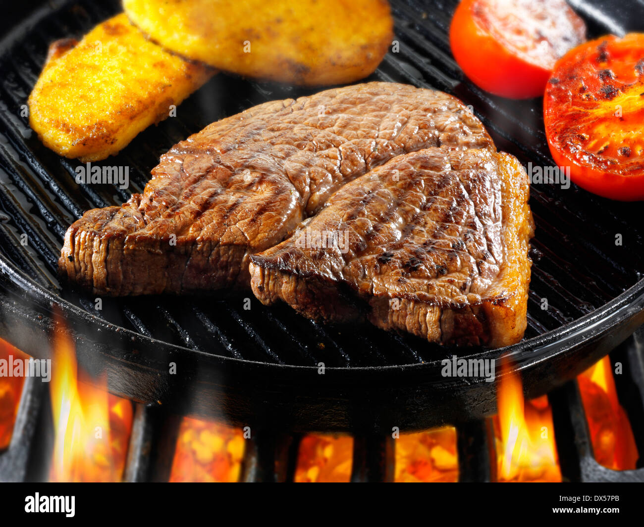 Beef rump steaks being pan fried on a bbq. Meat food photos, pictures