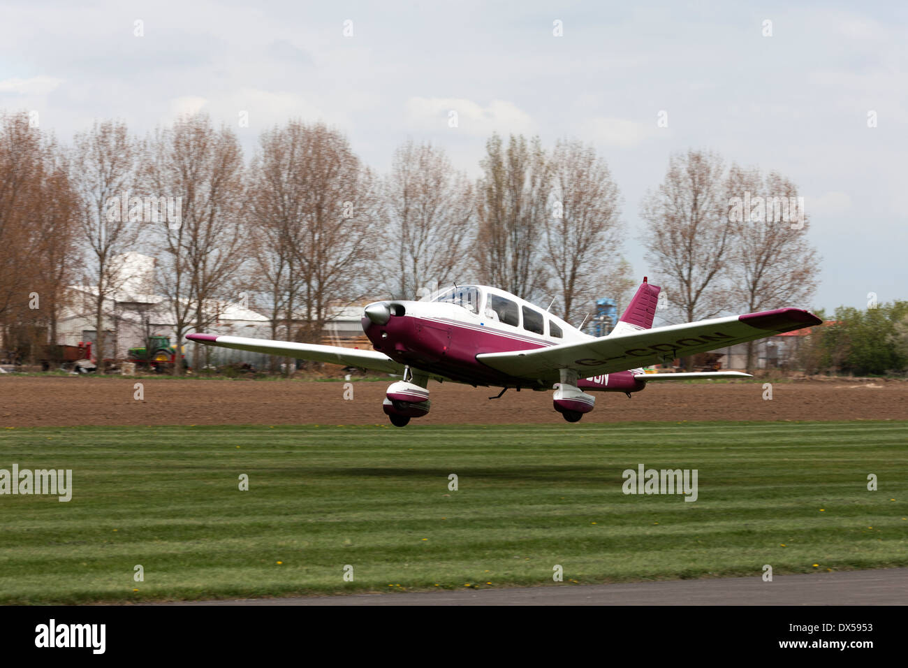 Piper PA-28-161 Cherokee Warrior II G-CDON taking-off from Breighton Airfield Stock Photo
