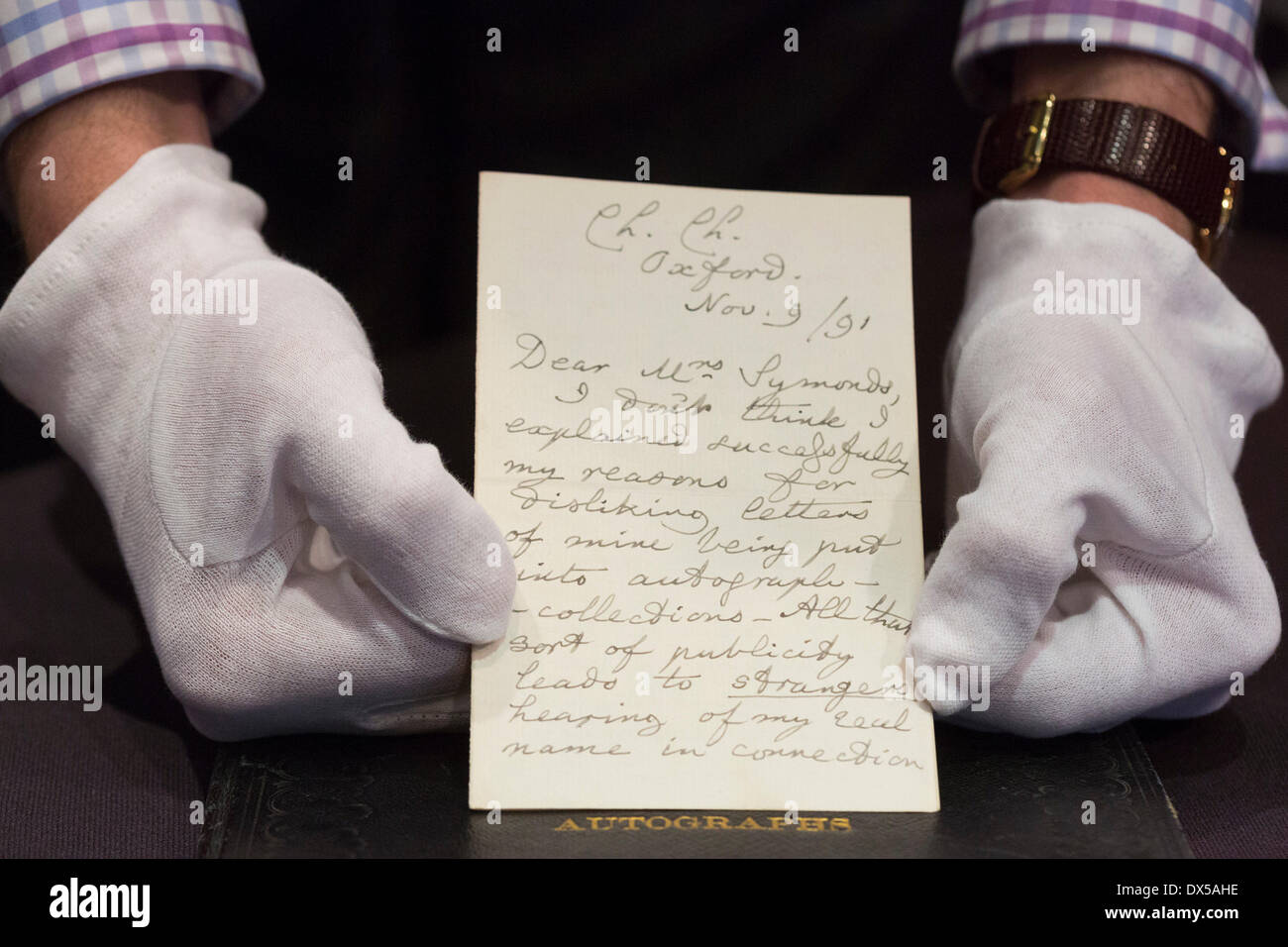 London, UK, 18 March 2014. The letter from Alice in Wonderland author Lewis Carroll (under his real name Charles Dodgson) to a friend complaining about the drawbacks of fame goes under the hammer and is expected to fetch £3,000-£4,000. In the letter, Carroll says he hated publicity so intensely that 'sometimes I almost wish I had never written any books at all'. The Bonhams' Books, Maps, Manuscripts and Historical Photographs auction takes place on 19 March 2014. Credit:  Nick Savage/Alamy Live News Stock Photo