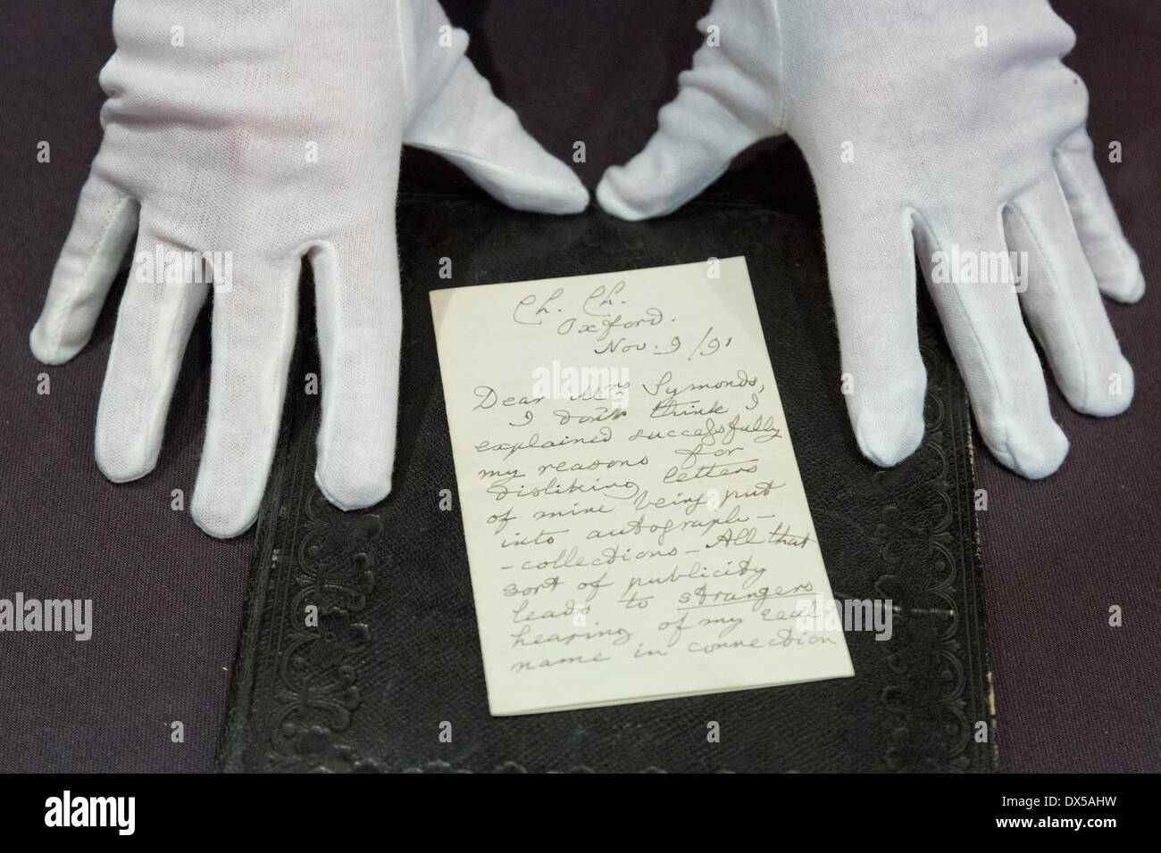 London, UK, 18 March 2014. The letter from Alice in Wonderland author Lewis Carroll (under his real name Charles Dodgson) to a friend complaining about the drawbacks of fame goes under the hammer and is expected to fetch £3,000-£4,000. In the letter, Carroll says he hated publicity so intensely that 'sometimes I almost wish I had never written any books at all'. The Bonhams' Books, Maps, Manuscripts and Historical Photographs auction takes place on 19 March 2014. Credit:  Nick Savage/Alamy Live News Stock Photo