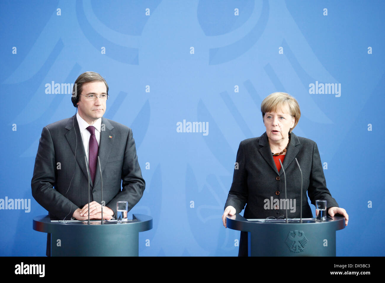 Berlin, Germany. Mars 18Th, 2014. The Chancellor receives the Portuguese Prime Minister Pedro Passos Coelho in the Chancellor's Office in Berlin to exchange views in the small Kreis. Discusses issues were the bilateral relations such as current European policy and international economic policy. / Picture: Pedro Passos Coelho, portuguese Prime Minister and German Chancellor Angela Merkel Credit:  Reynaldo Chaib Paganelli/Alamy Live News Stock Photo