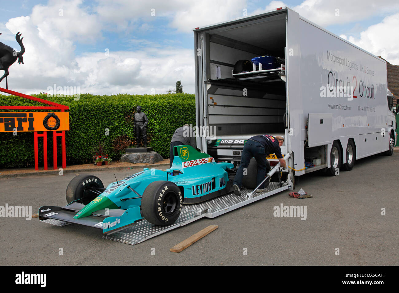 Loading a Benetton F1 car designed by Adrian Newey into a car transporter at Mallory Park, Leicestershire Stock Photo